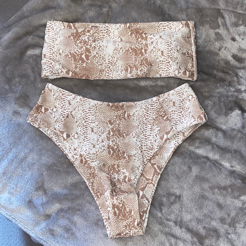 Strapless bikini top and high waisted bottoms.
